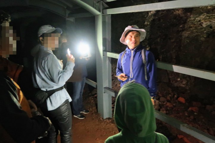 Walking through the long tunnels of a bunker underneath Seodal Oreum.