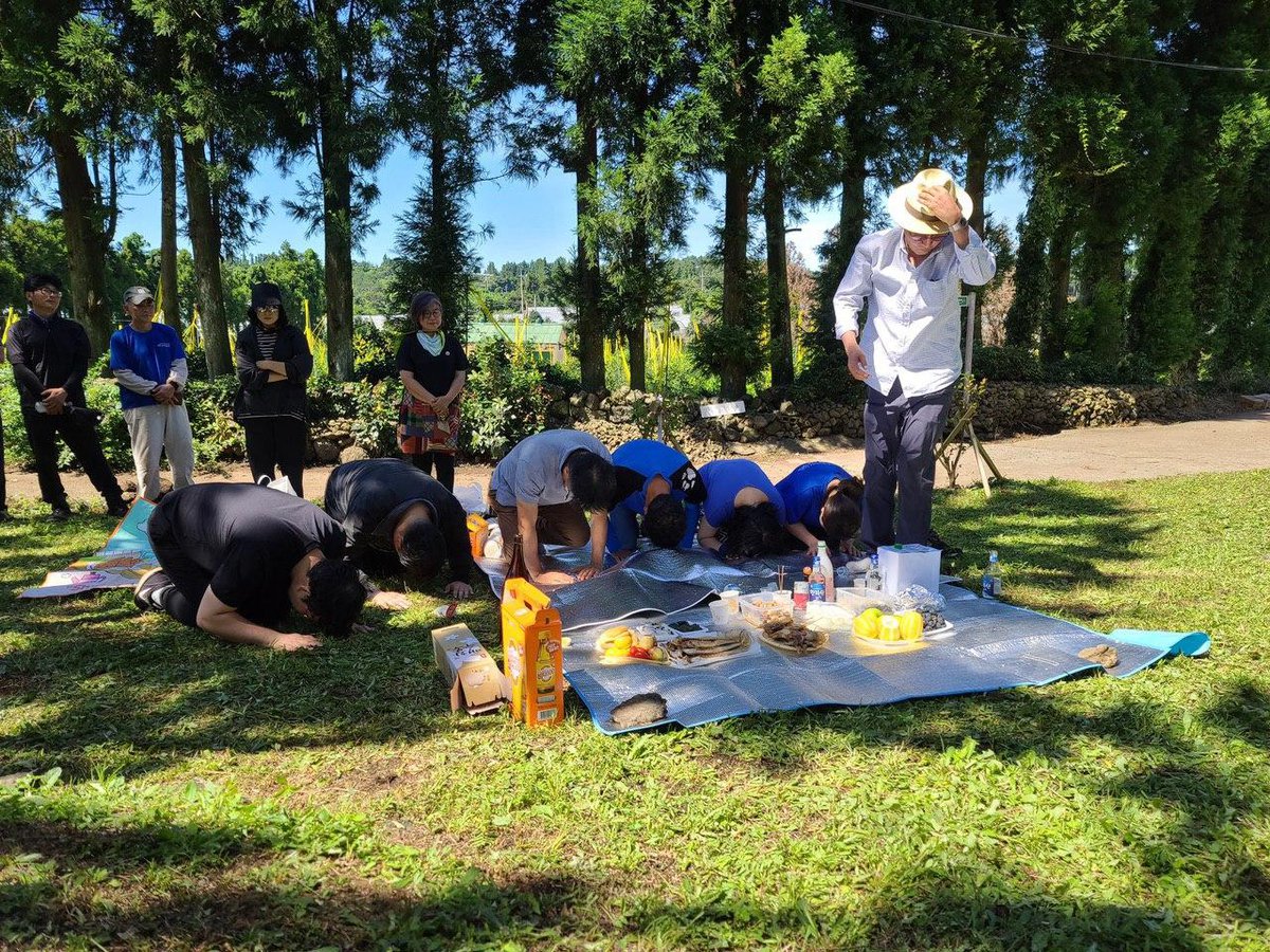 Jeju Dark Tours team performing Jesa